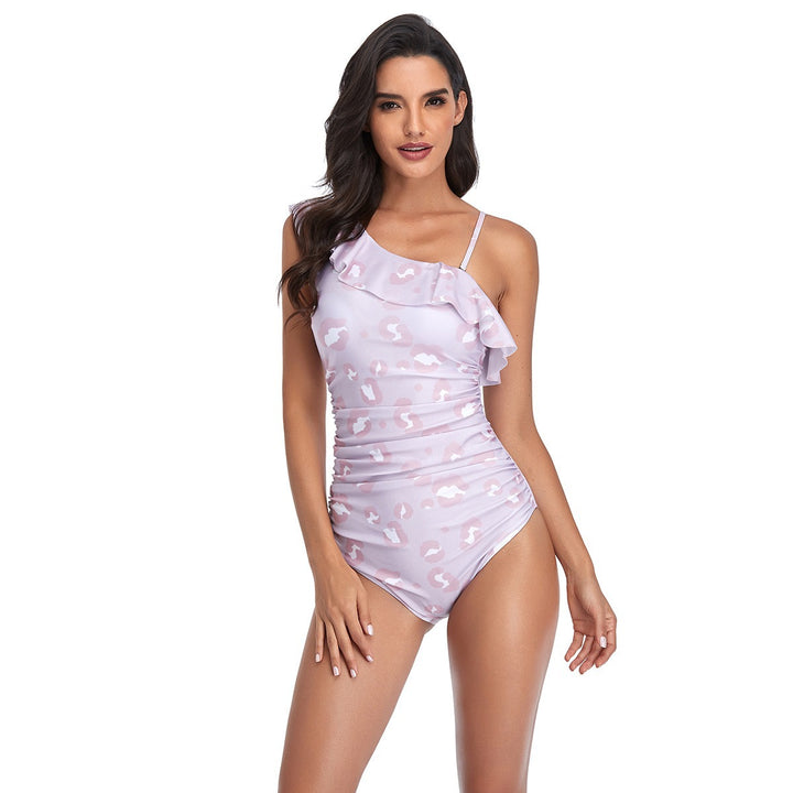 Dame Én-delt Badedragt med asymmetrisk Ruffles design og figurformende effekt Skovae