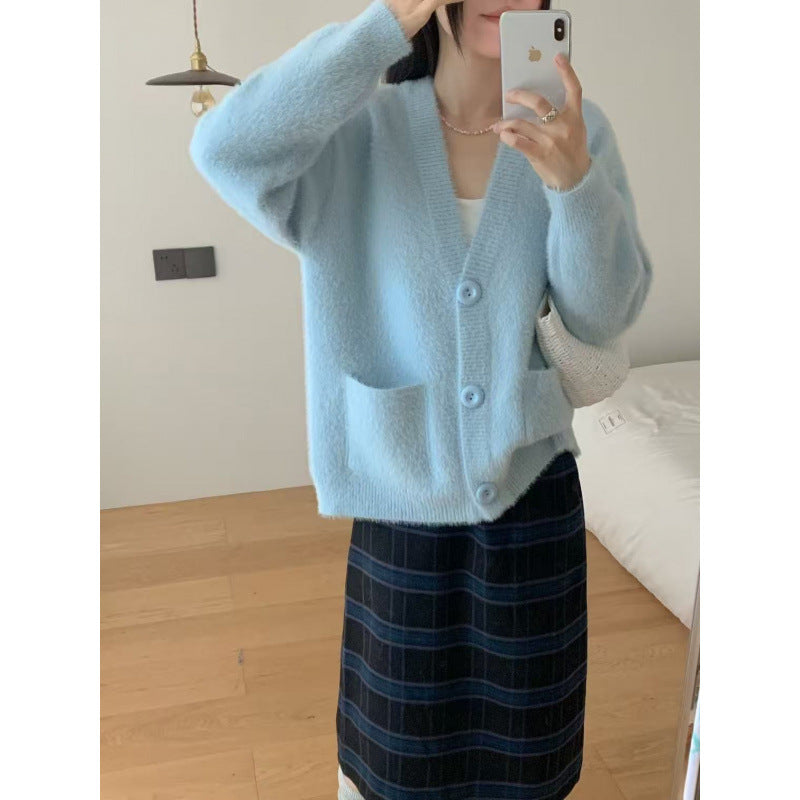 Kvinders fluffy knap cardigan med elegante lommer Stilla