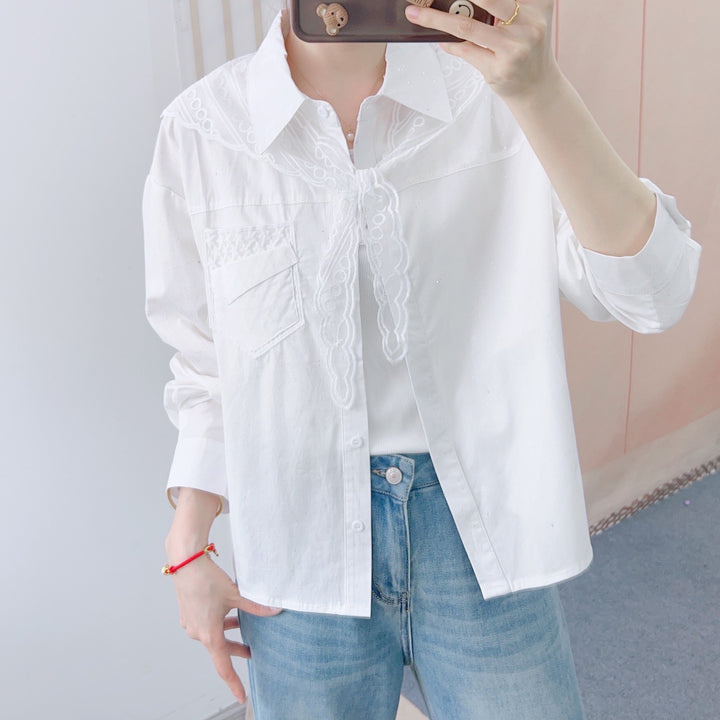 Dame elegant bluse med kunstneriske flæsedetaljer Stilla