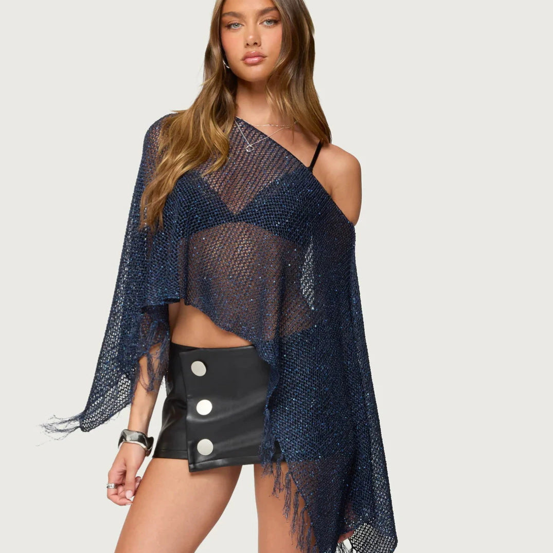 Dame netponcho med glitrende accenter Skovae
