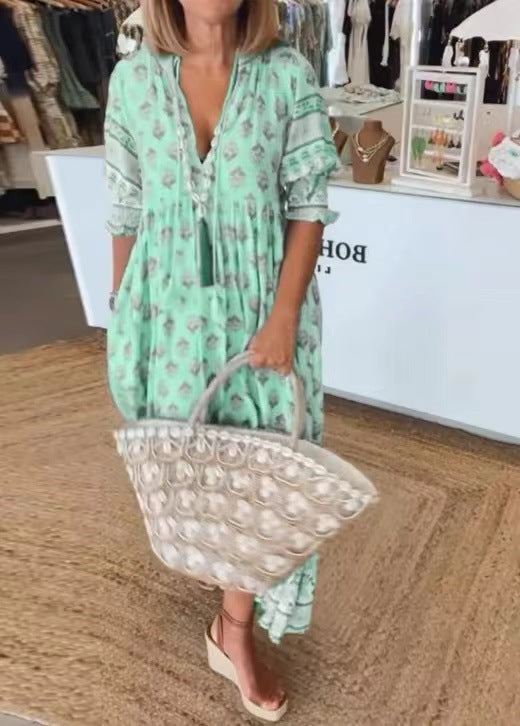 Dame Maxikjole med floralprint og stilfulde knapdetaljer Stilla