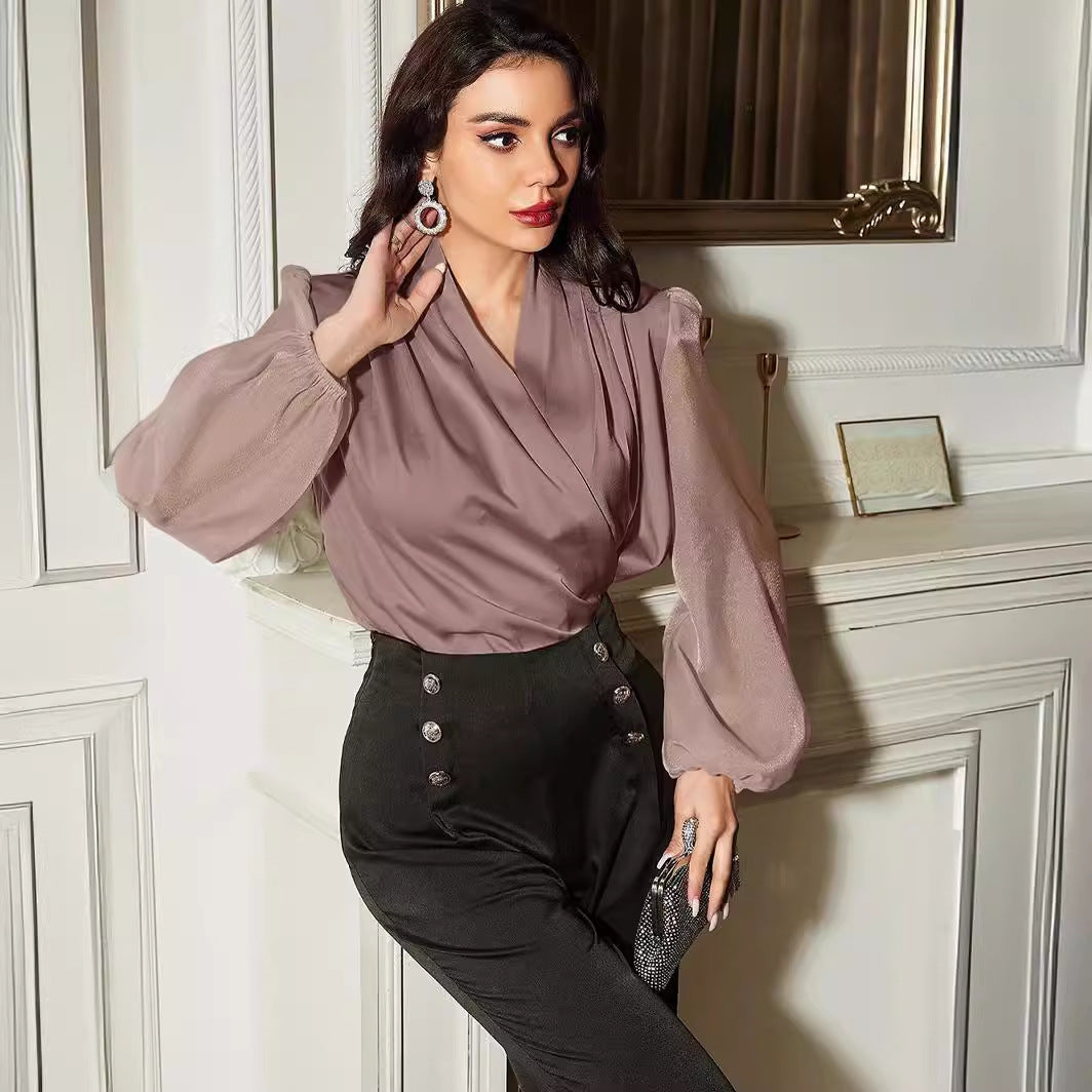 Damebluse med elegant vikleeffekt og gennemsigtige ærmer Stilla