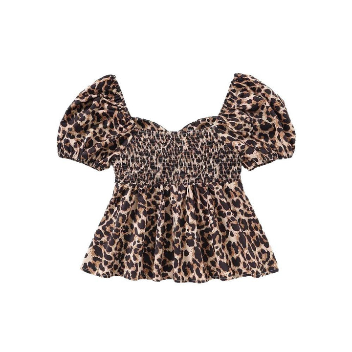 Dame bluse top med trendy leo mønster og voluminøse pufærmer Stilla