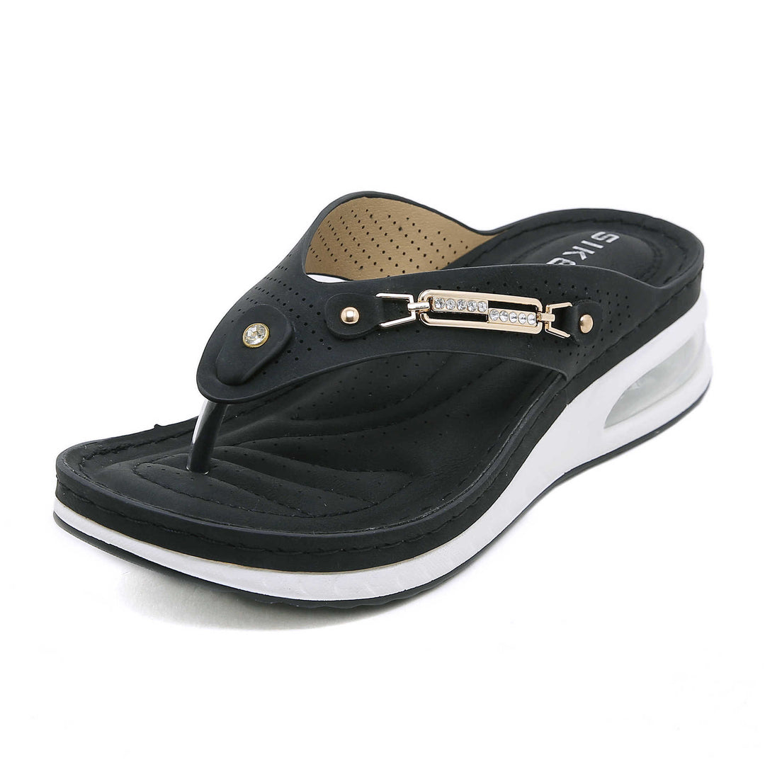 Dame flip-flops med innovativ dæmpningsteknologi og prydet rem Stilla