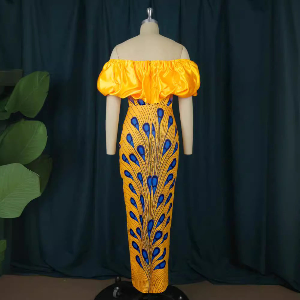 Dame Elegant aftenkjole med skulderfri design og voluminiøs flæsekant Skovae