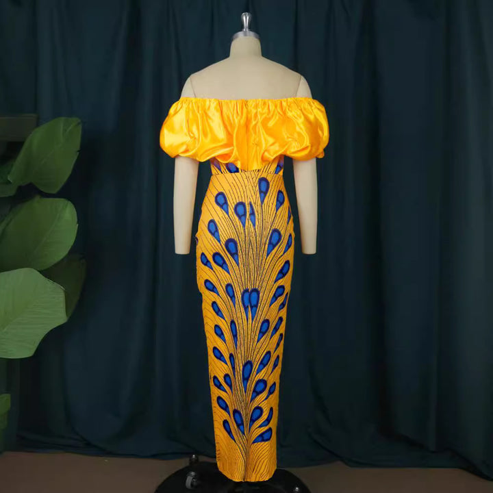 Dame Elegant aftenkjole med skulderfri design og voluminiøs flæsekant Skovae