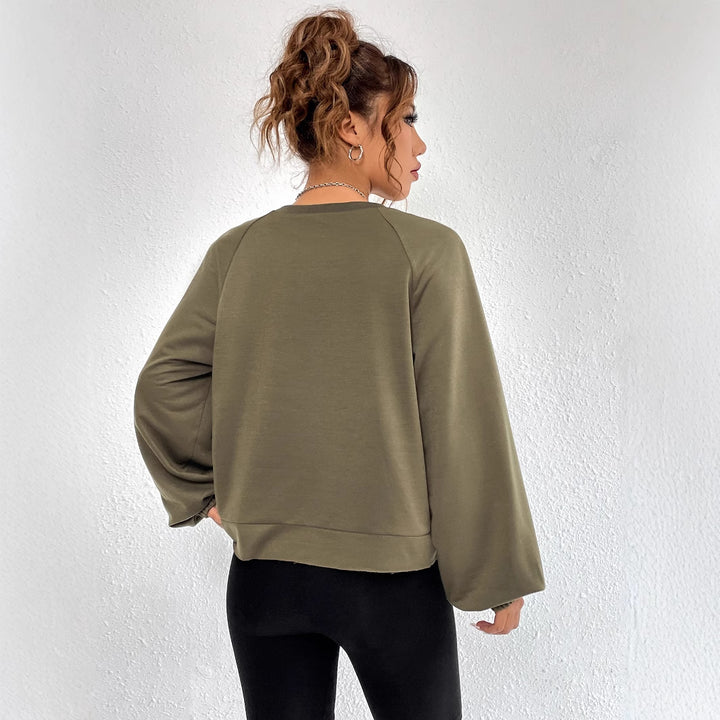Kvinders afslappede raglan sweatshirts med elastiske manchetter og minimalistisk design Stilla