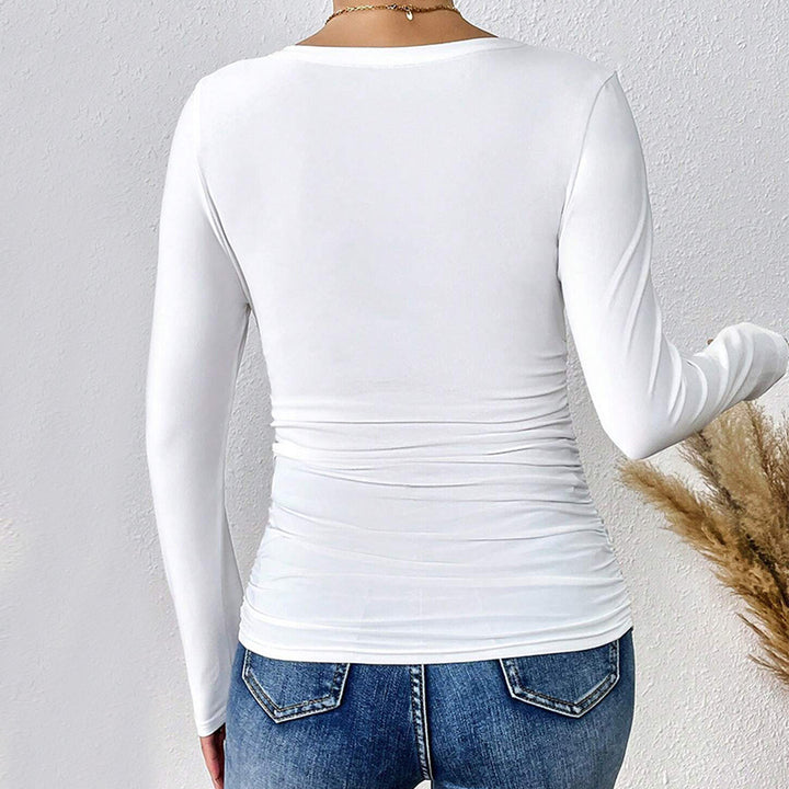 Kvindernes langærmede bodysuit med dyb V-hals og figurskulpturerende design Stilla