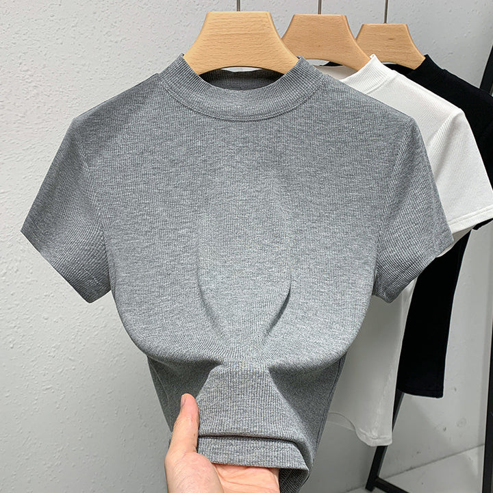 Dame figursyet T-shirt med højtstående krave i elastisk ribmateriale Stilla