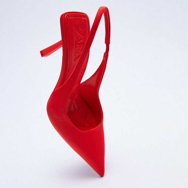 Dame Slingback-pumper med spids tåparti og elastisk rem Stilla