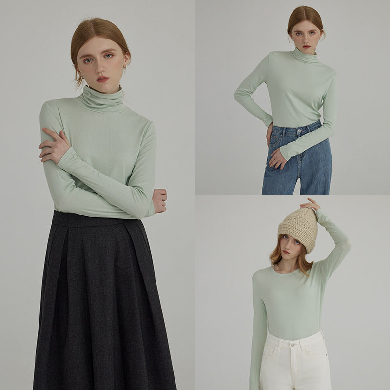 Dame langærmet bluse med moderne høj krave og minimalistisk silhuet Stilla