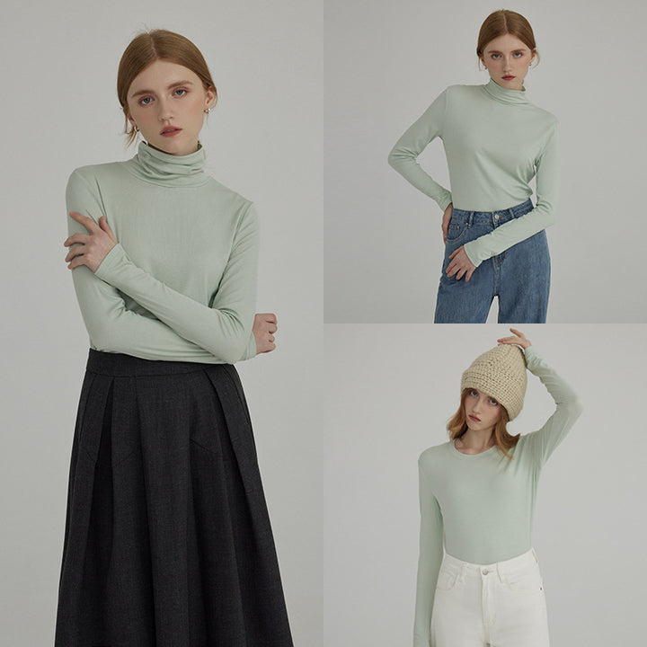 Dame langærmet bluse med moderne høj krave og minimalistisk silhuet Stilla