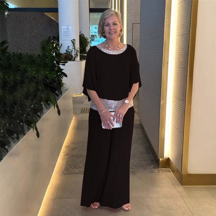 Dame Elegant kombi-outfit med flydende skær og glitrende accenter Stilla