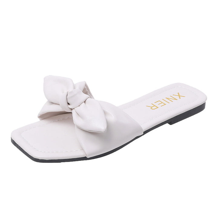 Dame mode slippers med legende sløjfe-design og behagelig sål Stilla