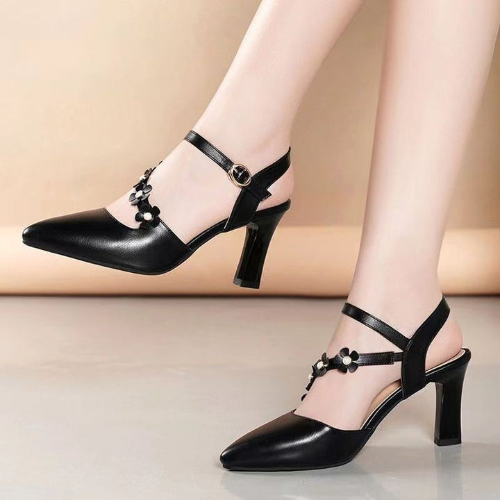 Dame Slingback-pumper med florale accenter og elegant spænde Stilla