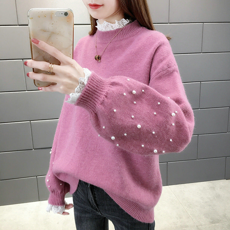 Dame trendy strikpullover med perledetaljer og voluminøse ærmer Stilla