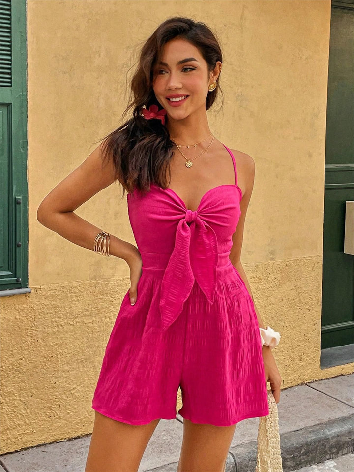 Dame jumpsuit med flot knudedetalje og luftig pasform Stilla