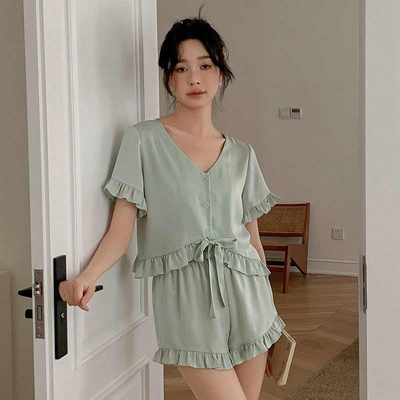 Dame Pyjama-sæt med voluminøst flæse design og elegant bælte Stilla