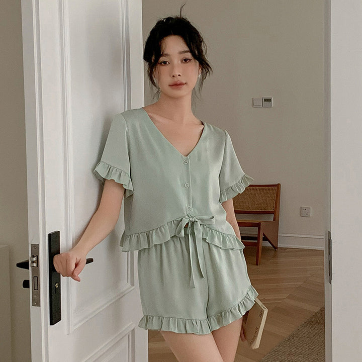 Dame Pyjama-sæt med voluminøst flæse design og elegant bælte Stilla