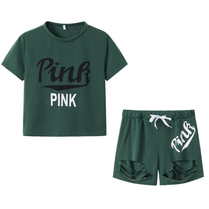 Damer sporty t-shirt og shorts sæt med løs pasform og kontrastprint Stilla