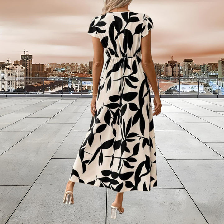Femme Floral Print Maxi Kjole med Cap-ærmer Stilla