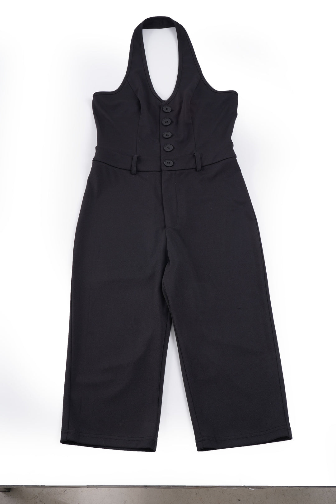 Dame jumpsuit med dyb V-udskæring og elegant knapdetalje Skovae