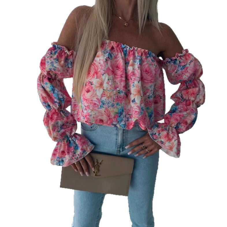 Damebluse med blomstret design og ballonformede ærmer Stilla