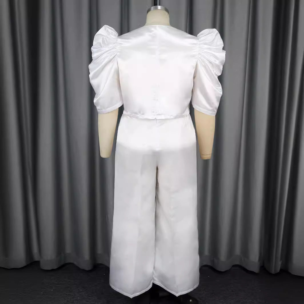 Damer Elegant jumpsuit med voluminøse puffærmer og smart talje detaljer Skovae