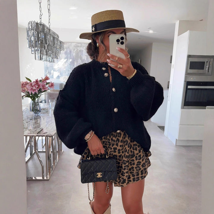 Kvinders fashionable cardigan med oversized ærmer og knapdetaljer Stilla