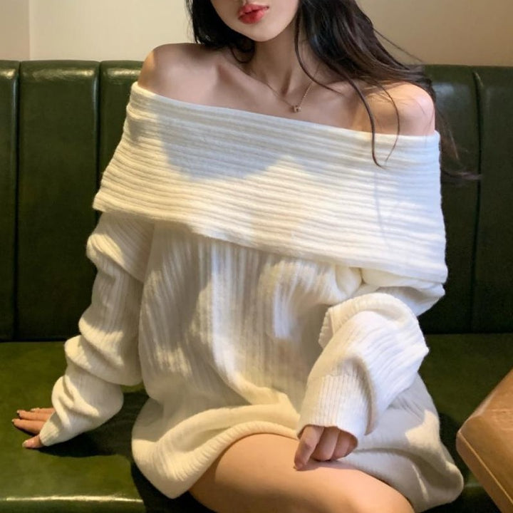 Kvinders off-shoulder sweater lavet af struktureret strikmateriale Stilla