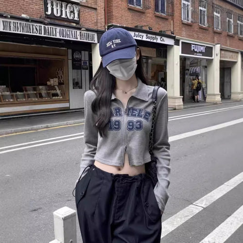 Kvindernes fashionable og sporty cropped shirt med lynlås Stilla