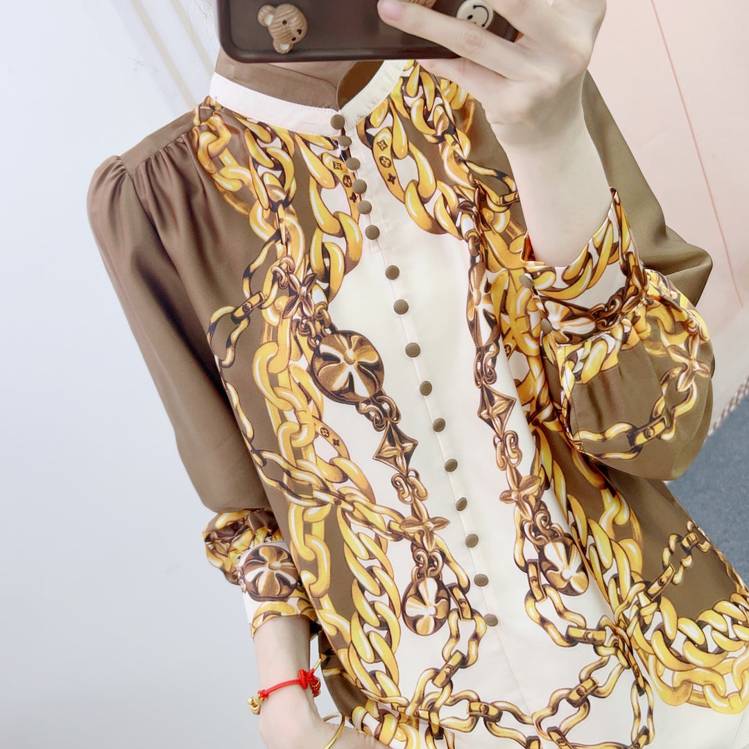 Dame chiffon-bluse med kunstnerisk kædemønster og elegante flæsedetaljer Stilla