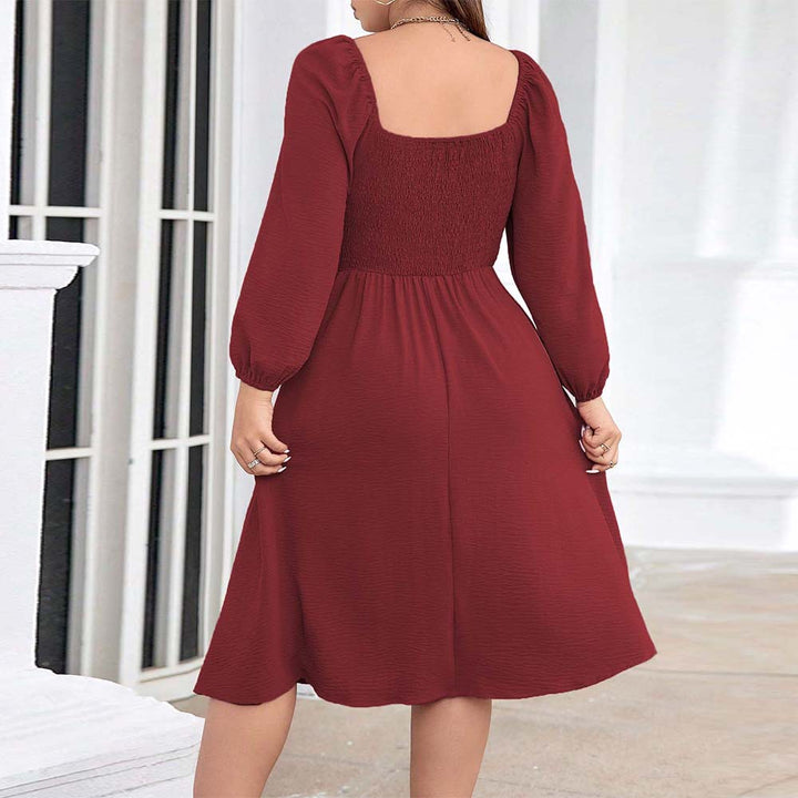 Dame Midi-kjole med elegant indviklingslook og puffærmer Stilla