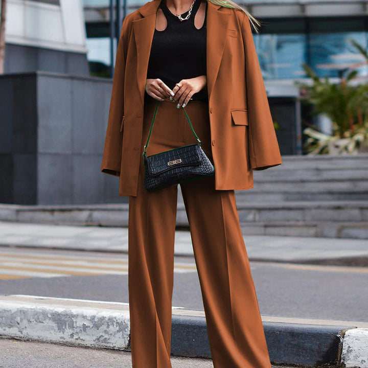 Dame Elegant og afslappet blazer-bukse sæt med bredt ben og innovative detaljer Stilla