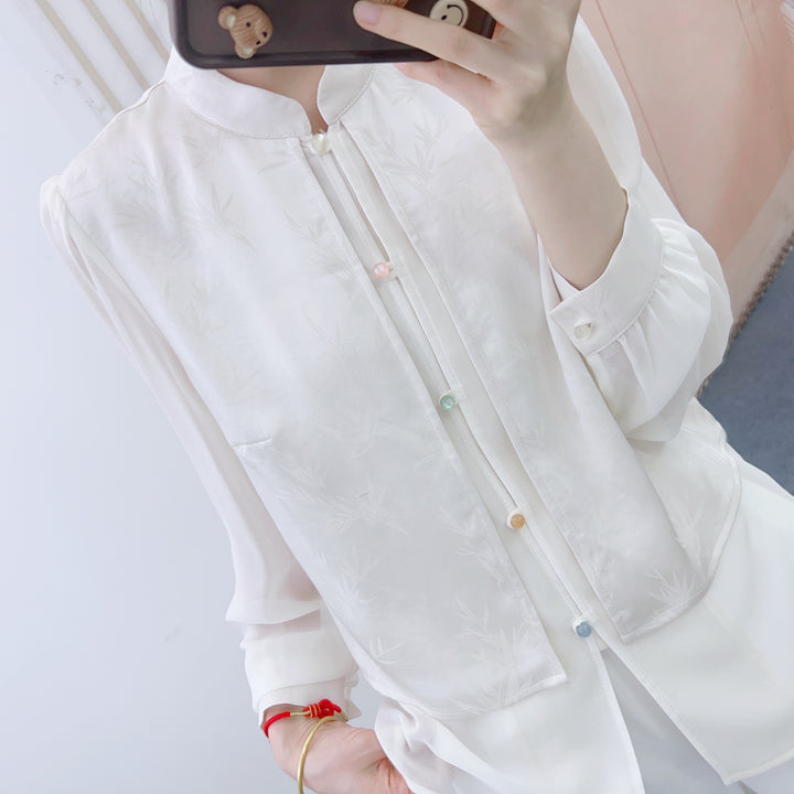 Damebluse med blomsterdesign og elegant krave Stilla