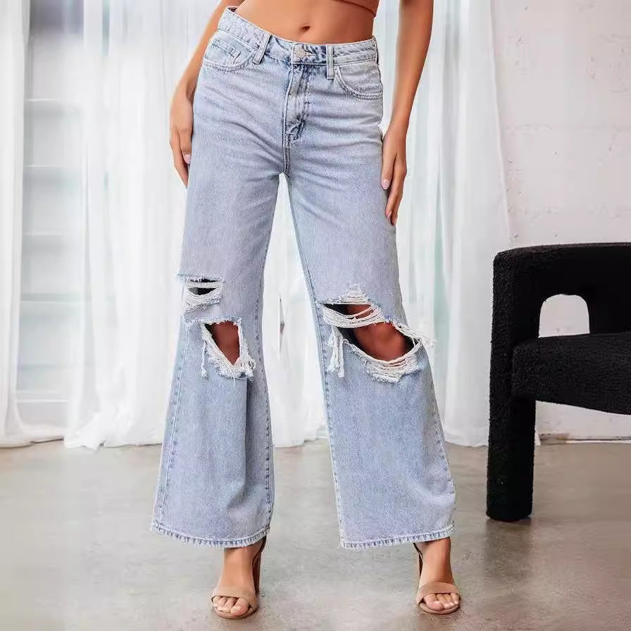Dame brede jeans med iøjnefaldende huller og trendy design Stilla
