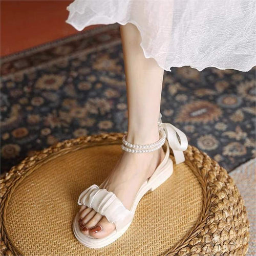 Dame Riemchen-sandaler med modigt flæse-design og elegante perle-accenter Stilla