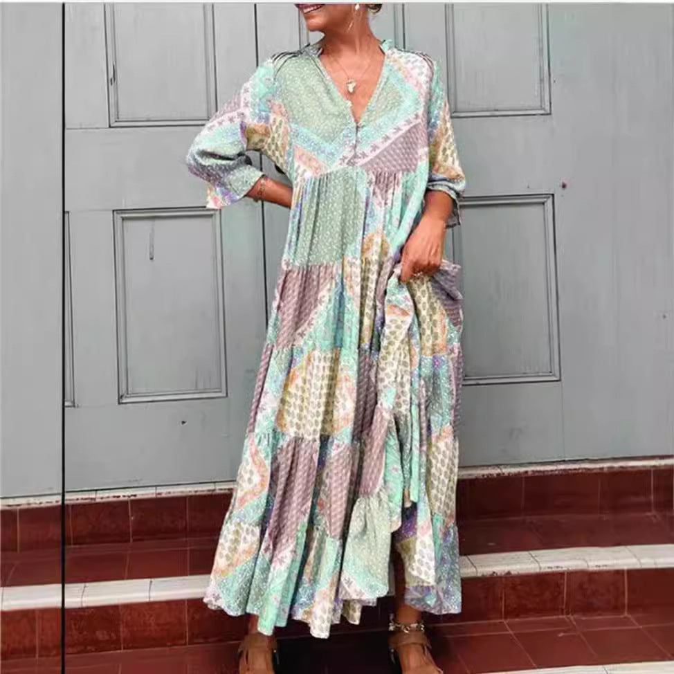 Dame maxidedragt med unikt patchwork-design og sidelommer Stilla