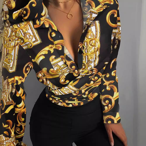 Damebluse med kreativttryk og elegante detaljer Stilla