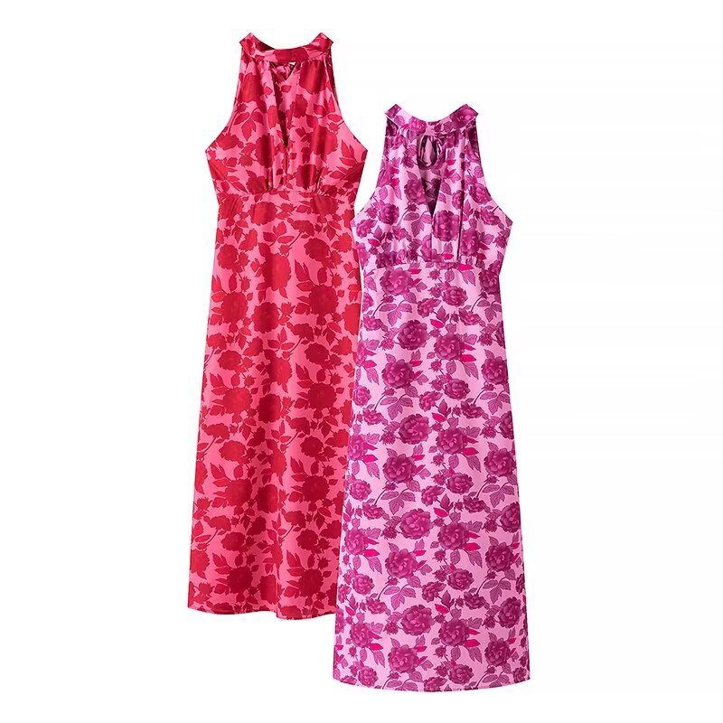 Dame maxikjole med floral trykdesign og elegant split Stilla