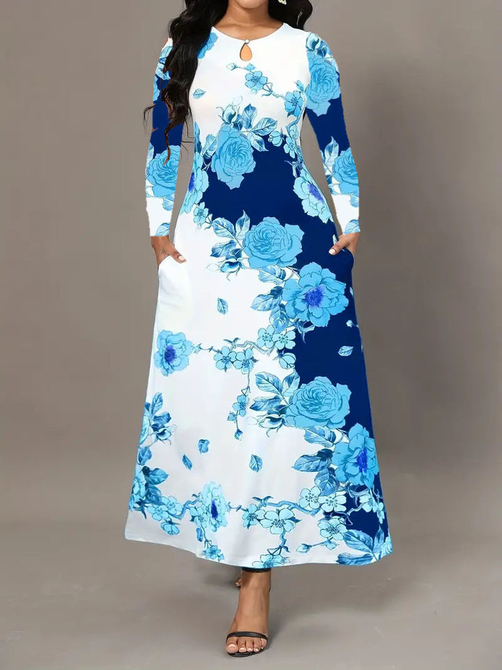 Dame Maxikjole med blomsterdesign og praktiske lommer Stilla