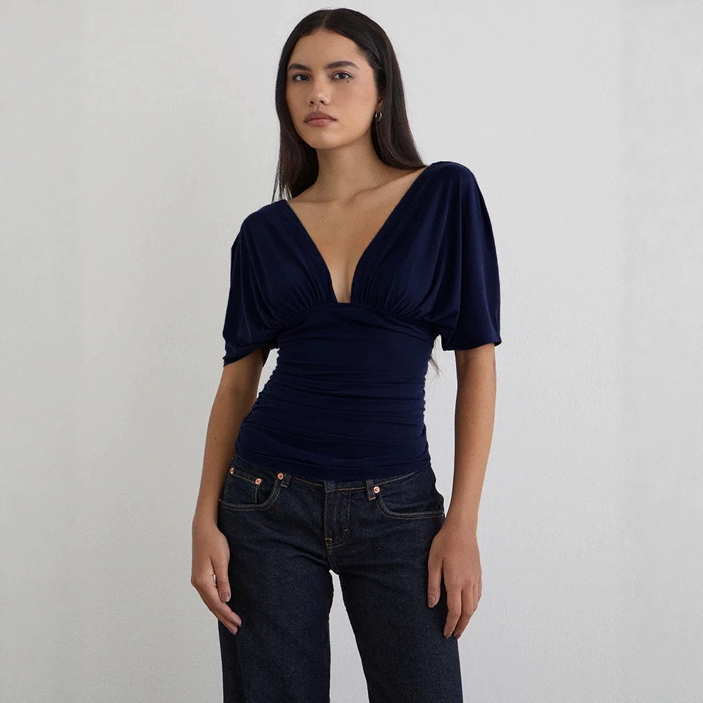 Dame Elegant top med dyb V-udskæring og afslappet draperingsdesign Skovae