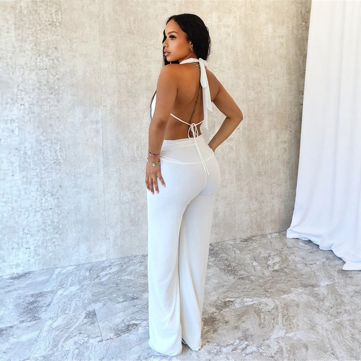 Dame Jumpsuit med elegant indpakningsdetalje og brede benpartier Skovae