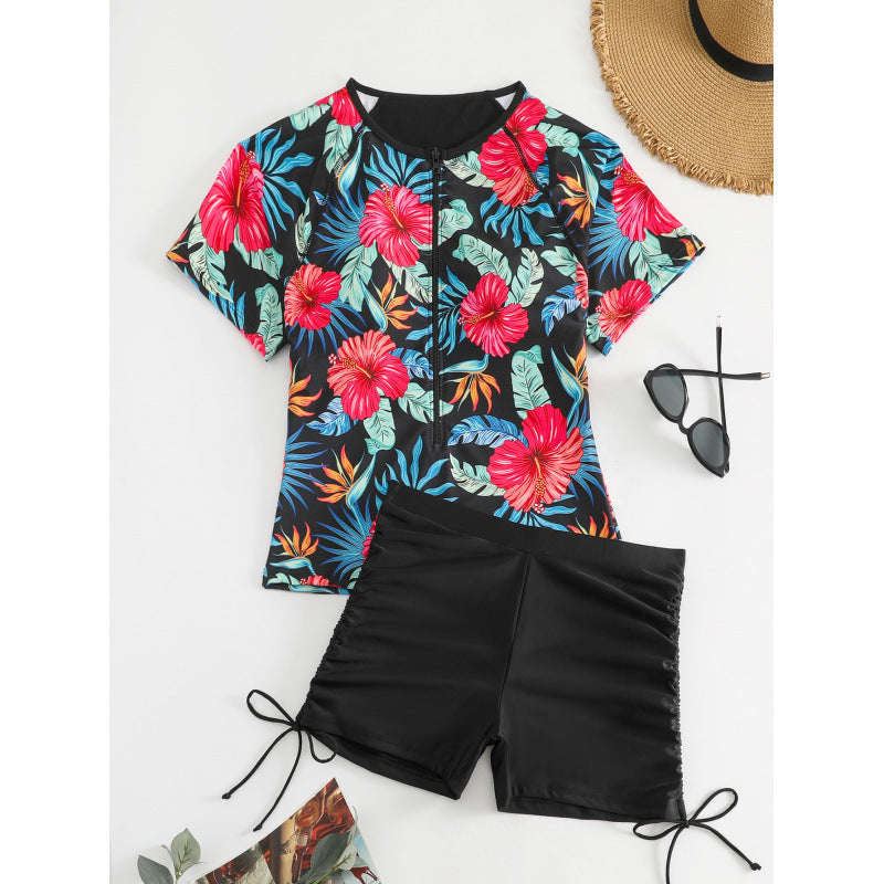 Dame Surf-badehnit-sæt med blomsteret kortærmet overdel og komfortable shorts Skovae