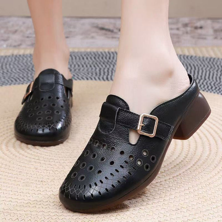 Dame Clogs med perforeret design og elegant spænde Stilla