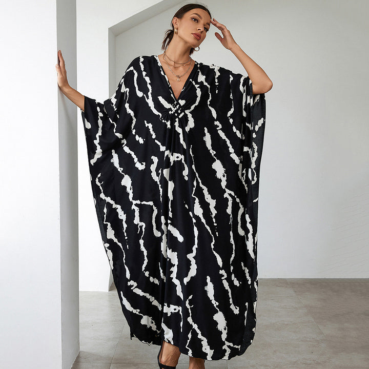 Dame Strandkaftan med elegant V-udskæring og farverigt mønster Stilla