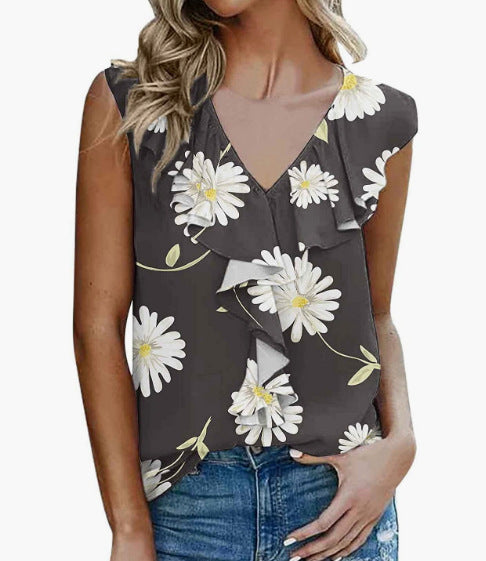 Dame blomstret flæsebluse med V-halsudskæring og ærmeløs design Stilla