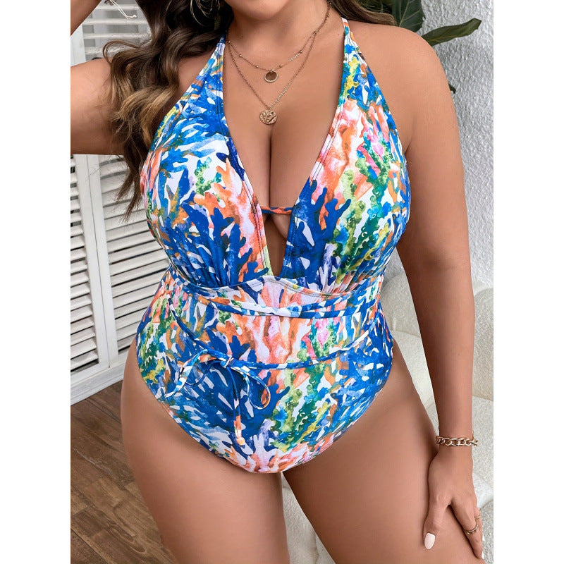 Dame en-delt badesuit med blomsterindpakket design og justerbart bånd Skovae
