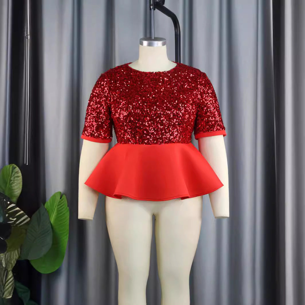 Damer elegant glitrende overdel med svajende peplum Skovae