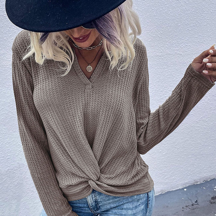 Damer afslappet V-hals pullover med knapdetaljer og knude design Stilla